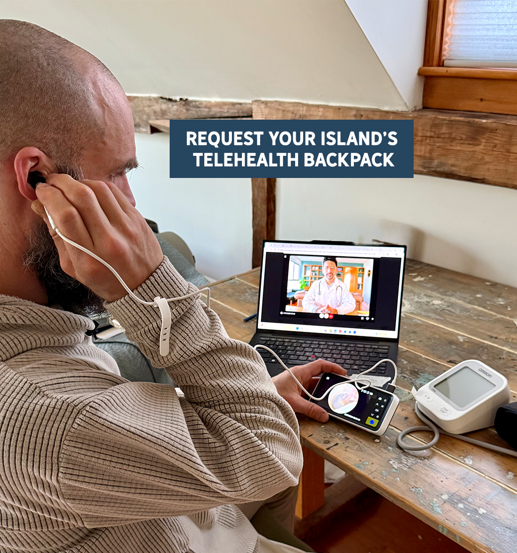 Man using telehealth backpack kit