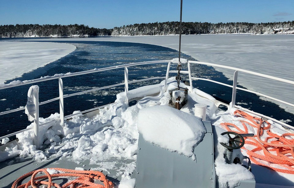 Color photo of the Mission's boat Sunbeam V breaking ice in 2020