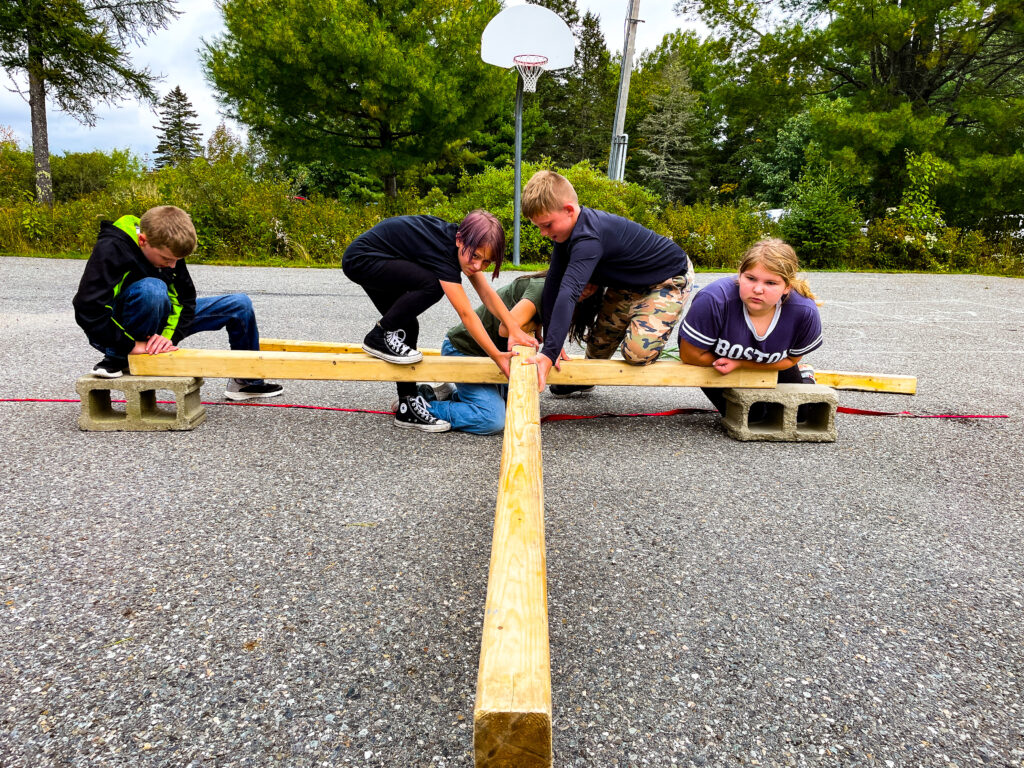 Students working on a team building exercise