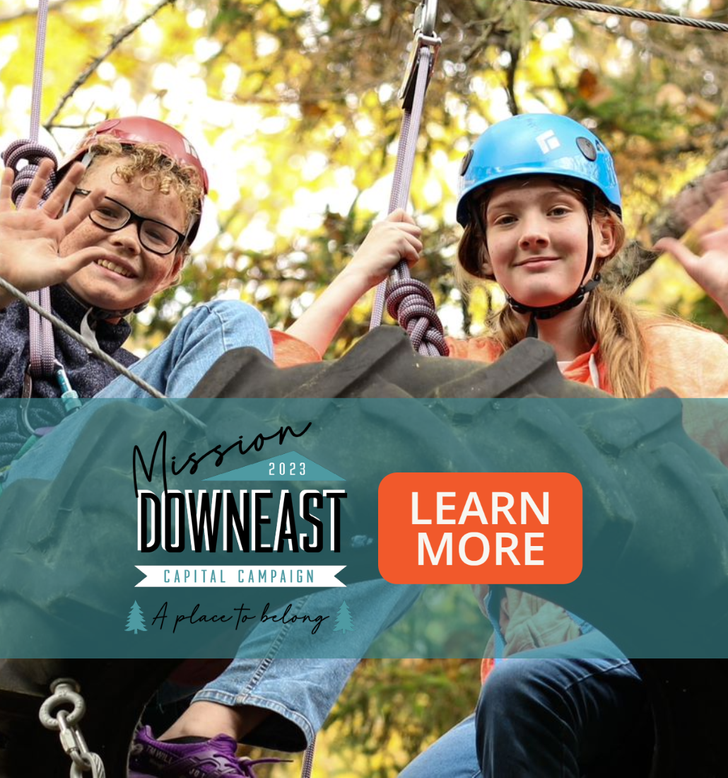 Color of photo of two white children wearing helmets on the high ropes course. A teal banner reads "Create a place to belong." Learn more by clicking this banner.