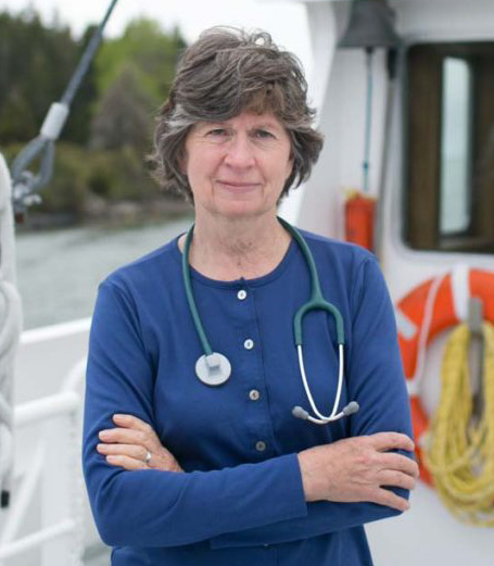 Sharon Daley, RN staring into the camera on the Sunbeam