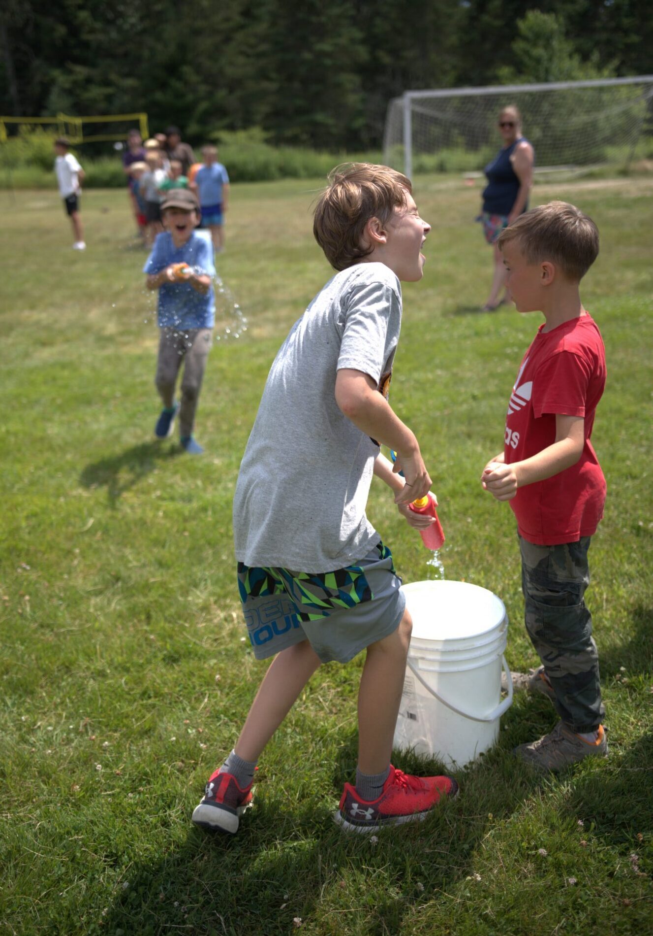 EdGE Camp students at Milbridge have a water fight