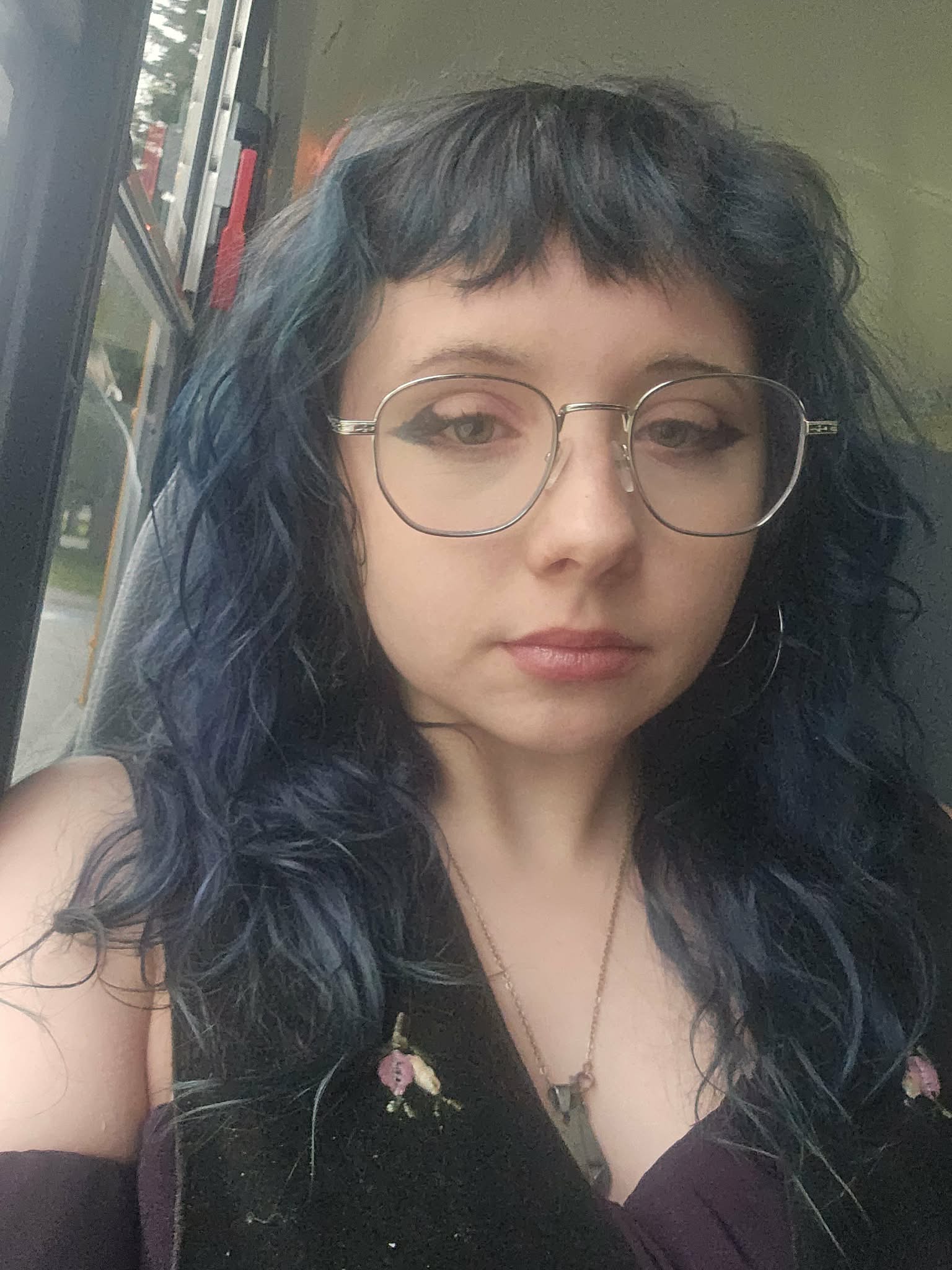 girl with glasses selfie